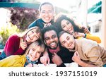 Small photo of Multiracial people taking selfie with opened face mask outdoors - Happy life style concept with young students having fun together after lockdown reopening - Bright backlight sunshine filter