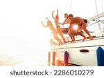 Small photo of Point of view on young friends jumping from sailboat by sea ocean trip - Guys and girls having summer fun together at sail boat party day - Luxury life style excursion concept on warm backlight filter