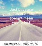 Small photo of Inspirational life quote with phrase "just because your path is different, doesn't mean you're lost" with retro style background.