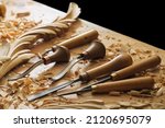 Woodworking tools. Carving wood with chisel. carpenter