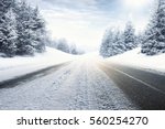 winter road and snow with landscape of trees with frost 