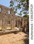Small photo of Butrint, Albania- 29 June 2014: Remains of a Christian basilica from the 6th century in Buthrotum, ancient Greek and later Roman city and bishopric in Epirus