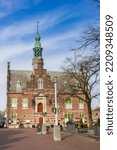 Small photo of PURMEREND, NETHERLANDS - MARCH 31, 2021: Cheese market square with old town hall in Purmerend, Nether;ands