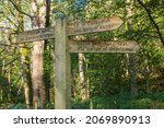 Small photo of 25.10.21 Bolton Abbey, North Yorkshire, UK Finger post sign saying Barden Bridgew, Bolton abbey and Simon seat in Strid woods near to Bolton abbey in the Yorkshire Dales