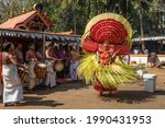 Small photo of Payyanur, India - December 5, 2019: Theyyam artist perform during temple festival in Payyanur, Kerala, India. Theyyam is a popular ritual form of worship in Kerala, India