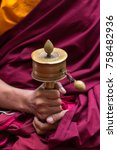 Tibetan Prayer Wheel In Monks...