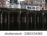 Small photo of BILBAO, SPAIN - March 12 2023: Cartel against the NATO
