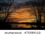 Small photo of sun set over misquote lake