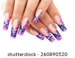 Female hand with floral art design nails  .