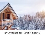 Snow Covered Chalet In The...