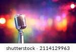 Small photo of Sing - Microphone For Live Karaoke And Concert - Retro Mic With Defocused Abstract Background