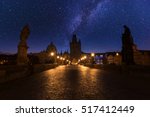Charles bridge (Karluv most) at night with starry sky, Prague, Czech Republic