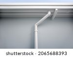 Small photo of Box or square style gutter at roof of house. May call rain gutter, eavestrough. Look new clean condition. To connection with pvc downpipe, downspout or spout, pipe and pipeline for drainage system.