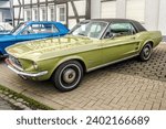 Small photo of WETTENBERG, HESSE, GERMANY - 07 - 28 - 2023: Classic FORD Mustang at a traditional Car Show Golden Oldies in Krofdorf-Gleiberg near Giessen, Hesse.