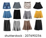 Set of various skirts on white background