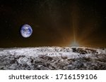 Sunrise above the moon surface. Blue Earth in the space. Elements of this image furnished by NASA.