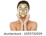 Woman With Green Peel Off Mask...