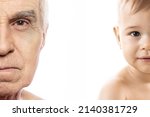 Small photo of Portrait of elderly man and baby boy. Concept of rebirth and cycle of life.