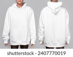 Small photo of Front and back views of a woman wearing a white, oversized hoodie with blank space, ideal for a mockup, set against gray background.