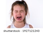 Cute little child is crying on...