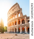 Small photo of Colosseum, or Coliseum. Morning sunrise at huge Roman amphitheatre, Rome, Italy