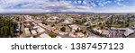 Roof tops streets and houses of Hunter valley town Cessnock. Wine making region in NSW, Australia - wide panoramic aerial view.