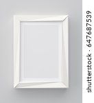 blank frame on gray wall ... | Shutterstock . vector #647687539