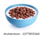Bowl with chocolate corn balls, milk, yogurt isolated on white background. With clipping path.