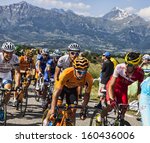 Small photo of LA ROCHETTE, FRANCE- JUL 16:The peloton pedaling on a plain road after the ascension to Col de Manse in The Alps during the stage 16 of 100 edition of Le Tour de France on July 16 2013 in La Rochette