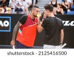 Small photo of MELBOURNE, AUSTRALIA - JANUARY 23: Nick Kyrgios with Thanasi Kokkinakis of Australia, against Ariel Behar of Uruguay and Gonzalo Escobar of Ecudor in the 2022 Australian Open at Melbourne Park