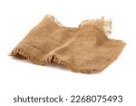 Small photo of Old burlap fabric napkin, sackcloth piece isolated on white background