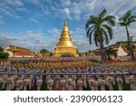 Small photo of Hundred thousand lantern festival in Lamphun is part of the Loi Krathong Festival or Yi Peng Festival To be offered as a Buddhist worship of Phra That Hariphun in lamphun, Thailand.