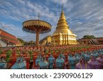 Small photo of Hundred thousand lantern festival in Lamphun is part of the Loi Krathong Festival or Yi Peng Festival To be offered as a Buddhist worship of Phra That Hariphun in lamphun, Thailand.