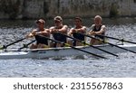 Small photo of ST NEOTS, CAMBRIDGESHIRE, ENGLAND - JULY 23, 2022: Mens Coxless Fours Scullers in race.