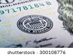 Federal reserve system symbol on hundred dollar bill closeup macro shot