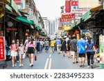 Small photo of Tainan, Taiwan- September 10, 2022: Tourists visit the Guohua Old Street in Tainan, Taiwan. There are many well-known traditional food stalls here.