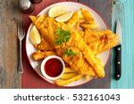 Fish On A Plate With Chips