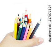 color pencil in hand on white... | Shutterstock . vector #217071529