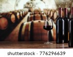 Wine cellar with wine bottle and glasses.with space for text
