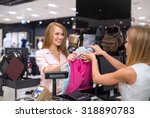 Woman at the checkout makes shopping