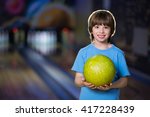 Smiling Boy In Bowling