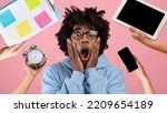Small photo of Appalled black guy wearing eyeglasses having troubles with time management, holding hands next to face and grimacing, hands with gadgets, schedule, alarm clock around, collage, panorama