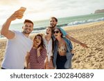 Small photo of Happy millennial european and arabic friends have fun, taking selfie on smartphone, enjoy free time on ocean beach. App for blog and social network, outdoor party, holiday and trip