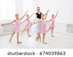 Young Ballet Teacher And...