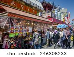 Small photo of TOKYO,JAPAN - 27 April 2014 :Ameyoko is a busy market street along the Yamanote near Ueno Stations.various products such as clothes, fresh fish, dried food and spices are sold along here