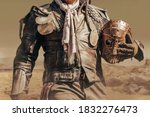 Small photo of Photo of a post apocalyptic raider warrior torso in leather jacket with metal armor standing in wasteland with steel mask.