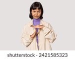 Small photo of Young Hispanic woman with short black hair in studio showing a timeout gesture.