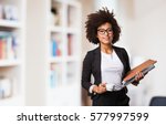 Business black woman holding a...