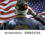 Veteran Saluting  in Front of US Flag