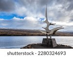 Small photo of Akureyri, Iceland - 16 October 2021: Sigling, meaning sailing or voyage, statue, by Jon Gunner Arnason, Akureyri, Northern Iceland. Sister to the famous Sun Voyager sculpture in Reykjavik